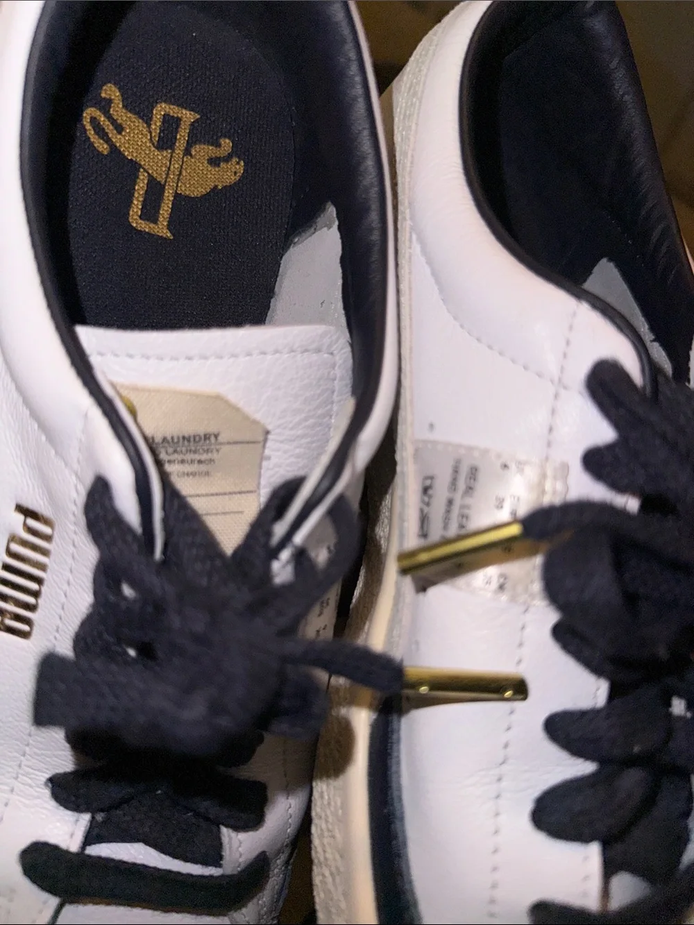 Puma White Leather Sneakers with Navy Laces and Gold Accents
